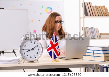 Female english language teacher in time management concept