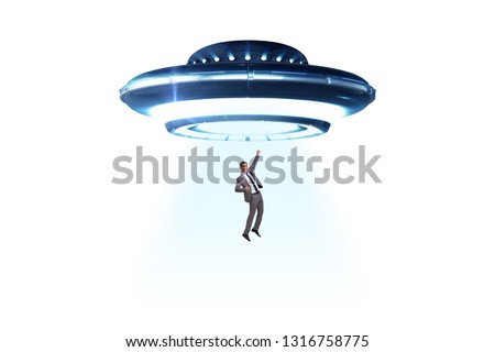 Flying saucer abducting young businessman