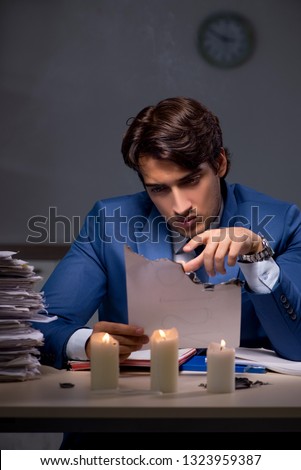 Businessman burning the evidence late in office