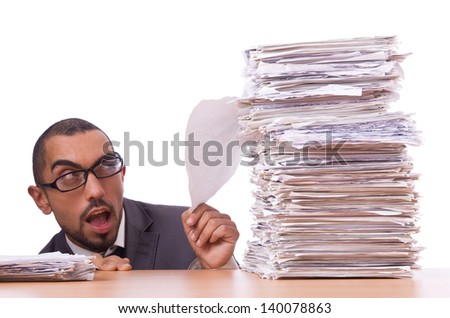 Busy businessman with lots of papers