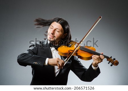 Man violin player in musician concept