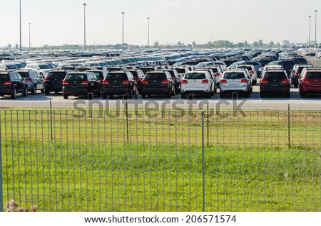 TUSCANY, ITALY - 27 June: New cars parked at distribution center in Tuscany, Italy. This one of biggest distribution centers in Italy.