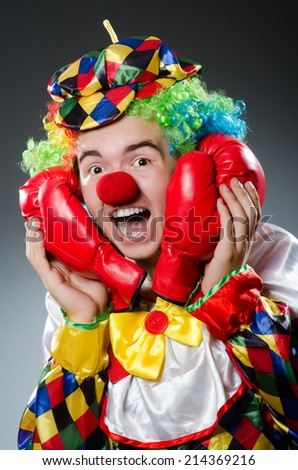 Funny clown with box gloves