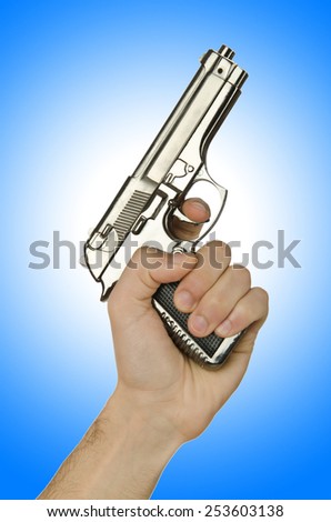 Gun in the hand on white