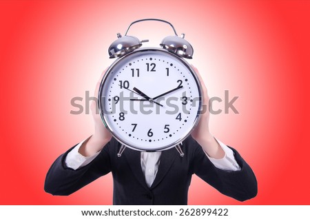 Funny woman with clock on white