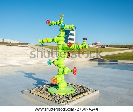 Modern art installation with oil industry piping