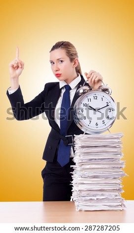 Woman businesswoman with clock and papers