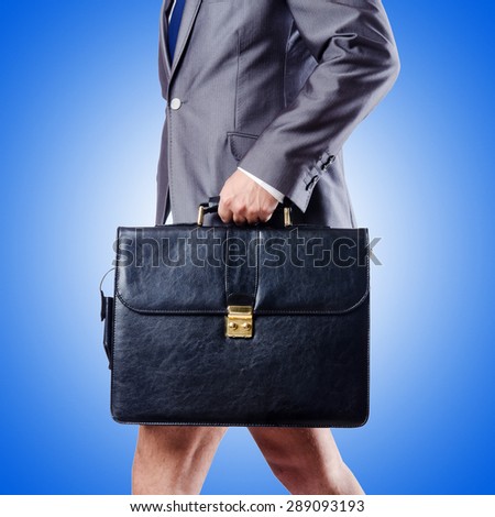 Nude businessman with briefcase against gradient