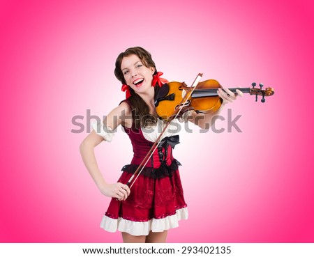 Young woman playing violin against gradient
