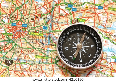 Compass over the map of UK  - London suburbs