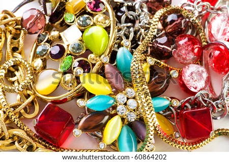 Jewellery arranged at the background Jewellery arranged at the background