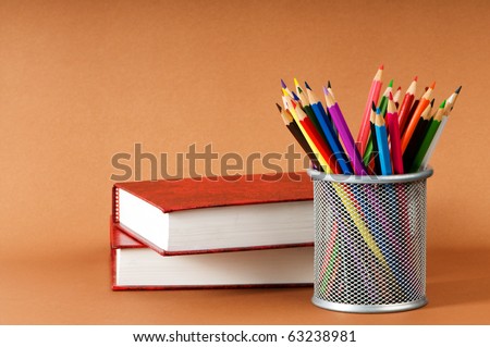 Back to school concept with books and pencils