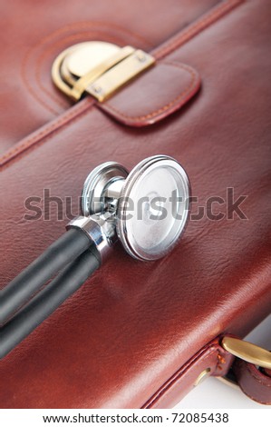 Doctor\'s brown leather case with the stethoscope