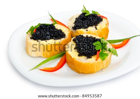 stock-photo-black-caviar-served-on-bread-84953587.jpg