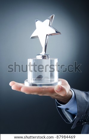 Businessman awarded with star award Businessman awarded with star award