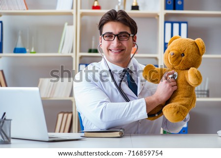 Doctor veterinary pediatrician holding an examination in the off