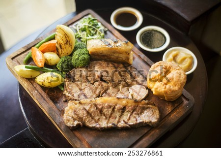 traditional english food sunday roast lunch in cozy restaurant pub
