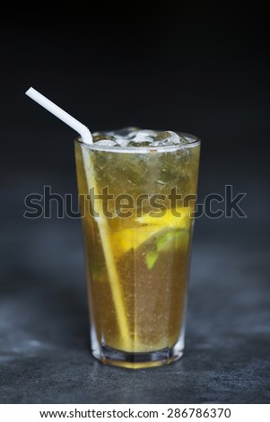 lemon and lime ice tea with brown sugar and angostura bitters glass