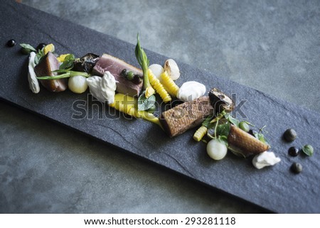 gourmet cuisine pork vegetables and sour cream