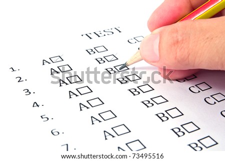 Hand choosing the test list on the examination