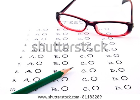The test list and pencil and glasses  on the examination