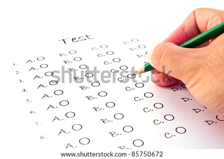Hand on pencil choosing the test list on the examination