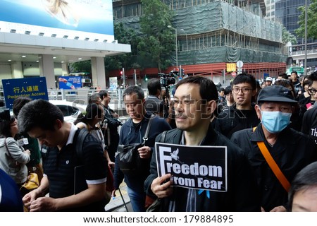 HONG KONG - March 2: Dr MA Ka Fai and 13000 Hongkongers march to condemn the brutal knife attack on Kevin Lau Chun-To, ex-editor of Ming Pao, and support press freedoms on March 2, 2014 in Hong Kong.