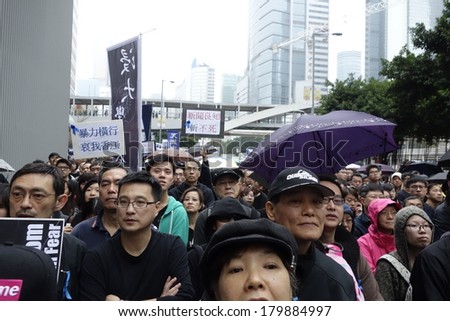 HONG KONG - March 2: 13000 of Hongkongers march to condemn the brutal knife attack on Kevin Lau Chun-To, ex-editor of Ming Pao, and support press freedoms on March 2, 2014 in Hong Kong.