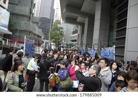 HONG KONG - March 2: 13000 of Hongkongers march to condemn the brutal knife attack on Kevin Lau Chun-To, ex-editor of Ming Pao, and support press freedoms on March 2, 2014 in Hong Kong.