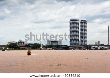 view of the Highrise building ,Rama VIII Bridge from the Chao Praya river