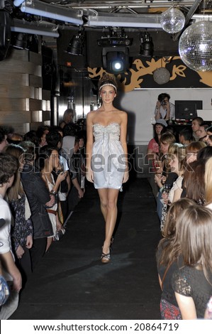 MELBOURNE - SEPTEMBER 25: A female model wearing garments by Anna Campbell at \