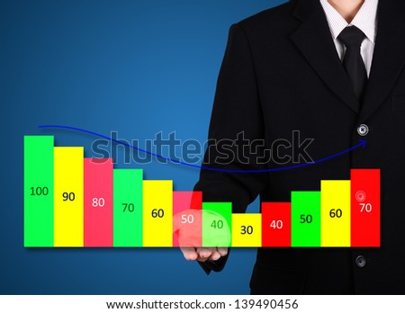 businessman present business statistic graph on blue