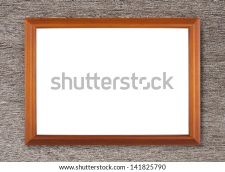 Brown wooden picture modern frame on ancient background - isolated