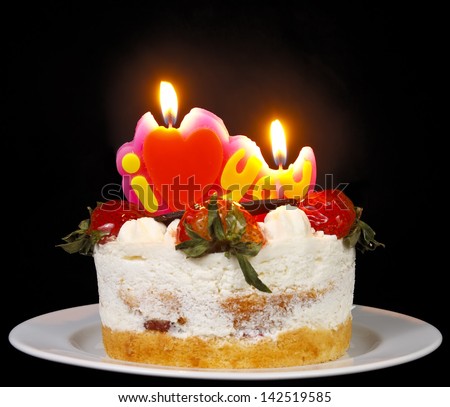 strawberry butter cream cake with heart candle on flashlight mix candlelight feeling