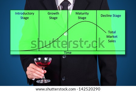 businessman holding wine glass show success business statistic graph on blue