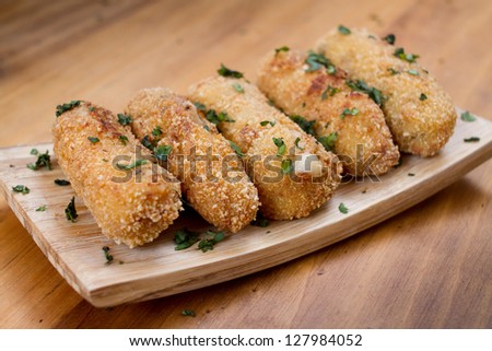 Ration of Croquettes. Typical Tapa of Spanish Cuisine with Rustic Presentation.