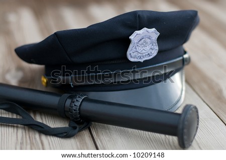Police equipment. Hat and truncheon