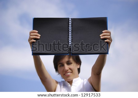 Funny girl with a black book