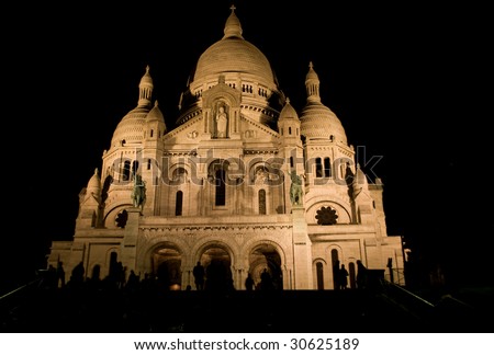 The Sacre Coeur basilica of Montmartre, Paris. Night view.