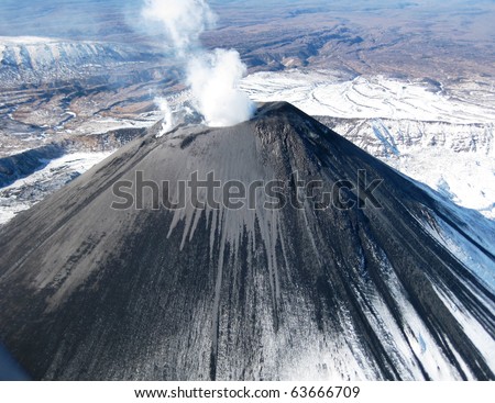 a volcano on the Kamchatka Peninsula, Russia. It is the most active volcano of Kamchatka\'s eastern volcanic zone