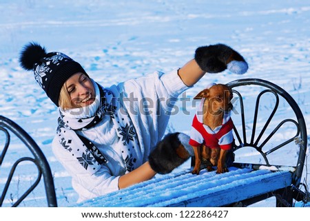 model girl play with dog in forest