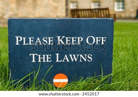 Please keep off the lawns, stone sign in the park
