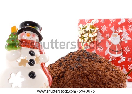 chocolate cake on white background with snowman, christmas wrap, gift, present