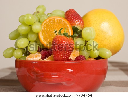 red bowl full of mixed fruits, healthy diet alternative, natural source of vitamins