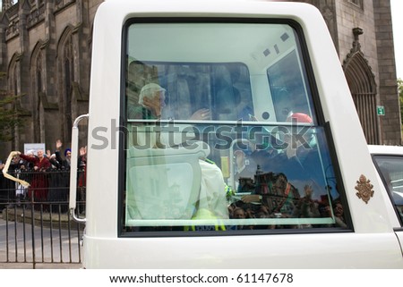 EDINBURGH, SCOTLAND, UK - SEPTEMBER 16: Pope Benedict XVI in his popemobile travels through Princess St. on September 16, 2010 in Edinburgh, Scotland, United Kingdom. On his way to Archbishop House.