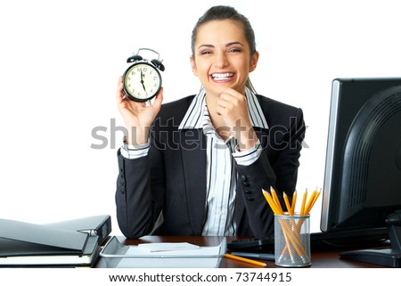 happy office worker holds clock which shows almost 5 o\'clock, time to go home concept, deadline, isolated on white