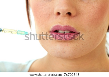 lips injection, young female face, close-up of lips, isolated on white