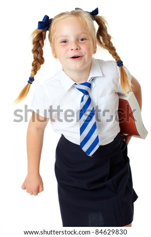 stock photo Blonde schoolgirl holds large book shoot over white 