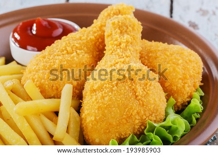 breaded chicken drumstick french fries leg