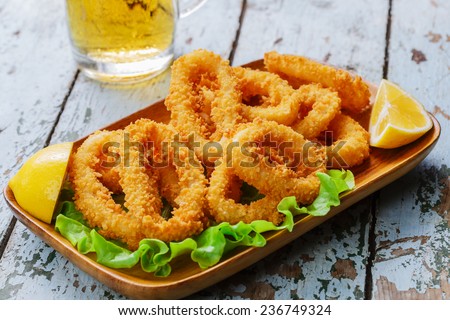 fried squid ringsÂ breaded with lemon